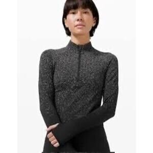 Lululemon Rest Less Cropped in the Herringbone Fade Black/White color - Size 10